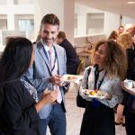 Delegates Networking During Conference Lunch Break